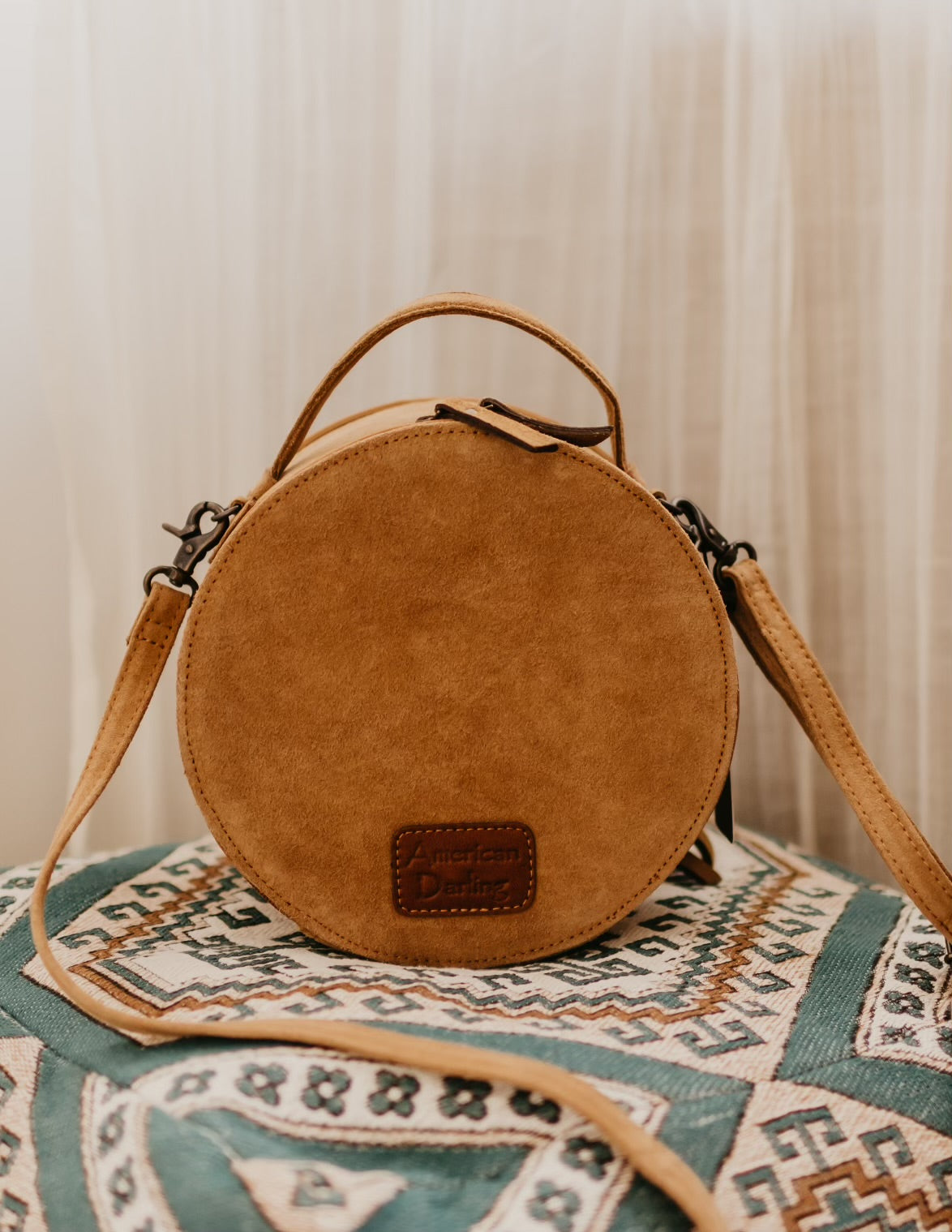 Round suede bag sale